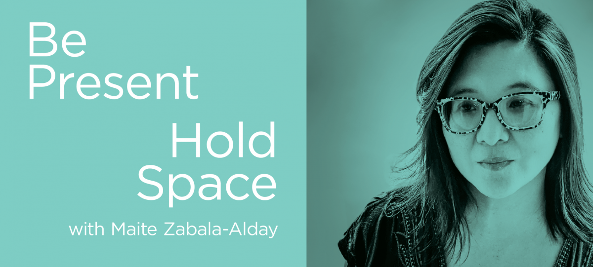 Image of empowered female wearing glasses with a calm pastel teal overtone with the words reading: Hold Space with Maite. Zabala-Alday